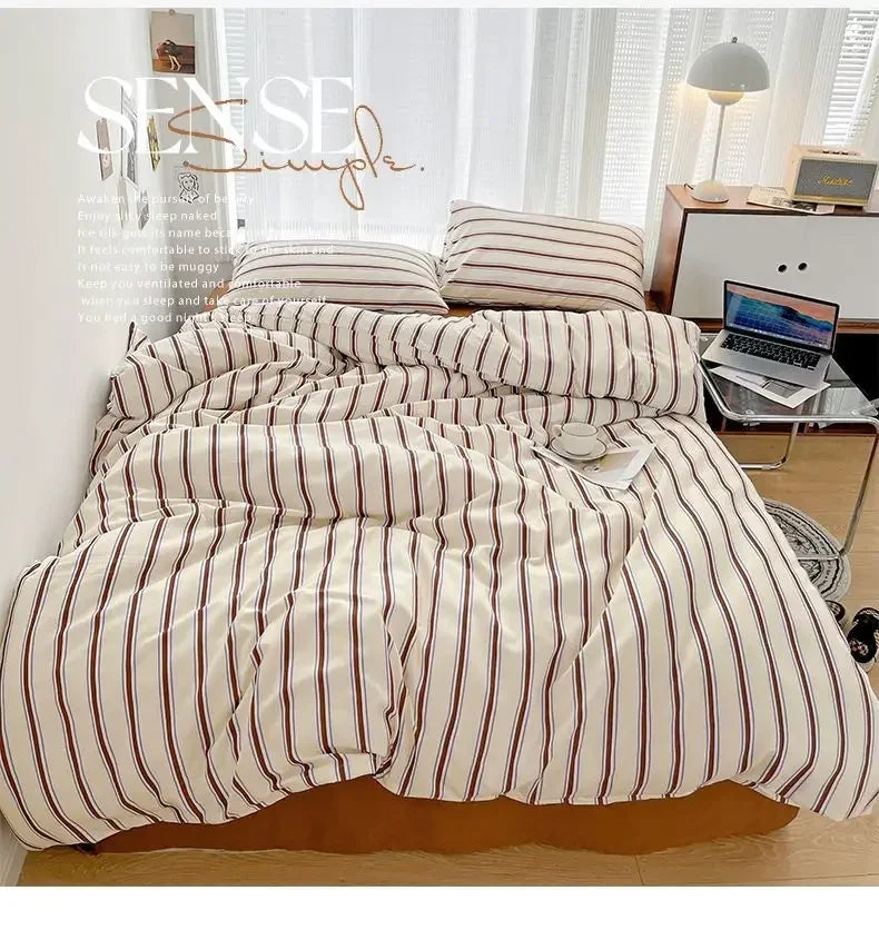 Simple Red and Blue Striped Duvet Cover and Four Piece Bed Sheet Set with Washed Cotton Bedding on the Bed