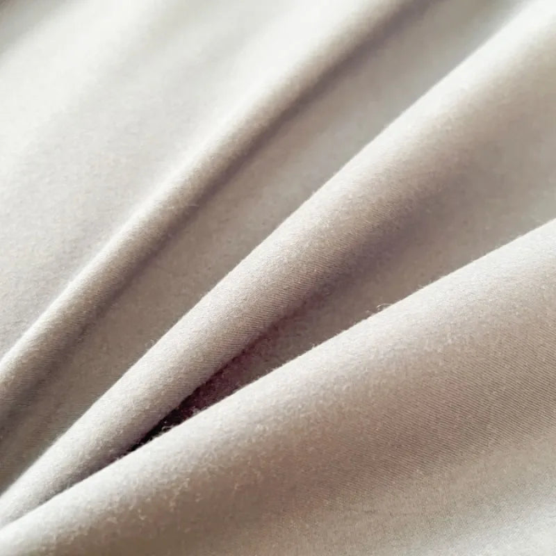 2025 new solid color abraded four-piece set of color matching sheets for home use, comfortable, skin-friendly and breathable